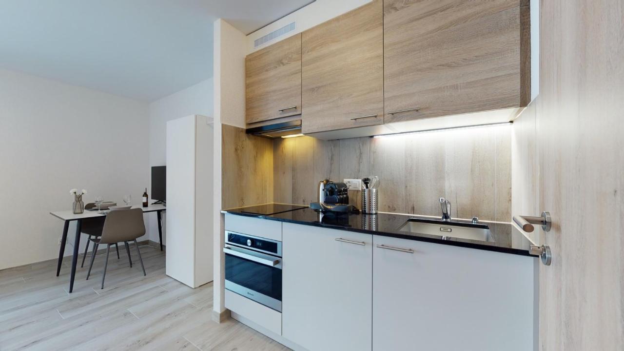Nonanteneuf Appart Hotel Aigle - Contactless Check-In Bagian luar foto